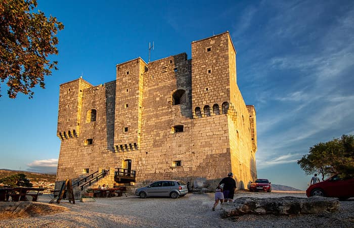 Nehaj Fortress, the square stone tower on its hill above the town of Senj